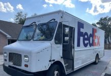 FedEx van with bullet holes