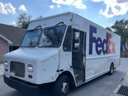 FedEx van with bullet holes