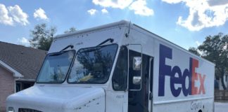 FedEx van with bullet holes