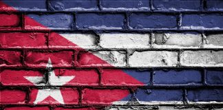 Cuban flag painted on brick wall