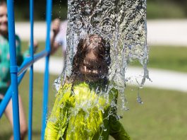 Child playing in splashpad