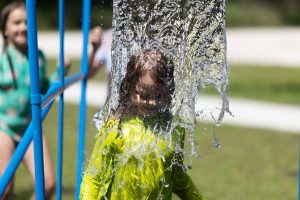 Child playing in splashpad