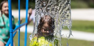 Child playing in splashpad