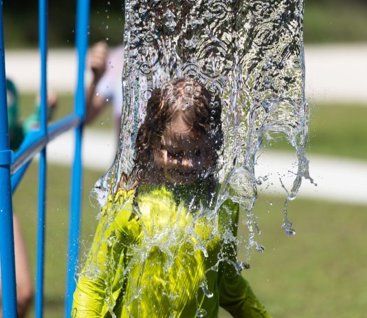 Child playing in splashpad