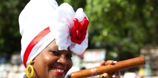 Cuban woman holding a cigar