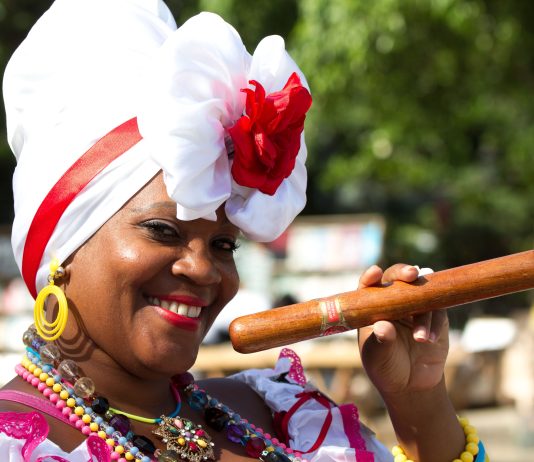 Cuban woman holding a cigar