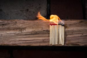 Match sticks lit on fire.