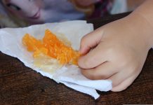 A child eating an orange