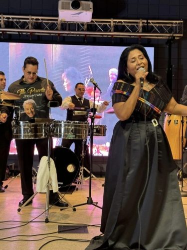 Grace Resendez McCaffery singing with Tito Puente, Jr. and Marco Sepulveda